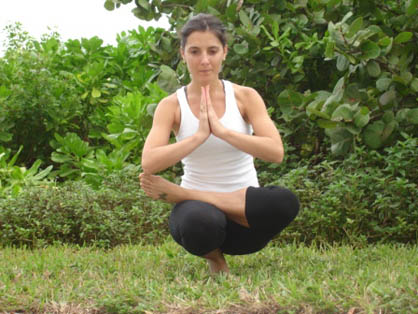 toe stand pose or padangustasana